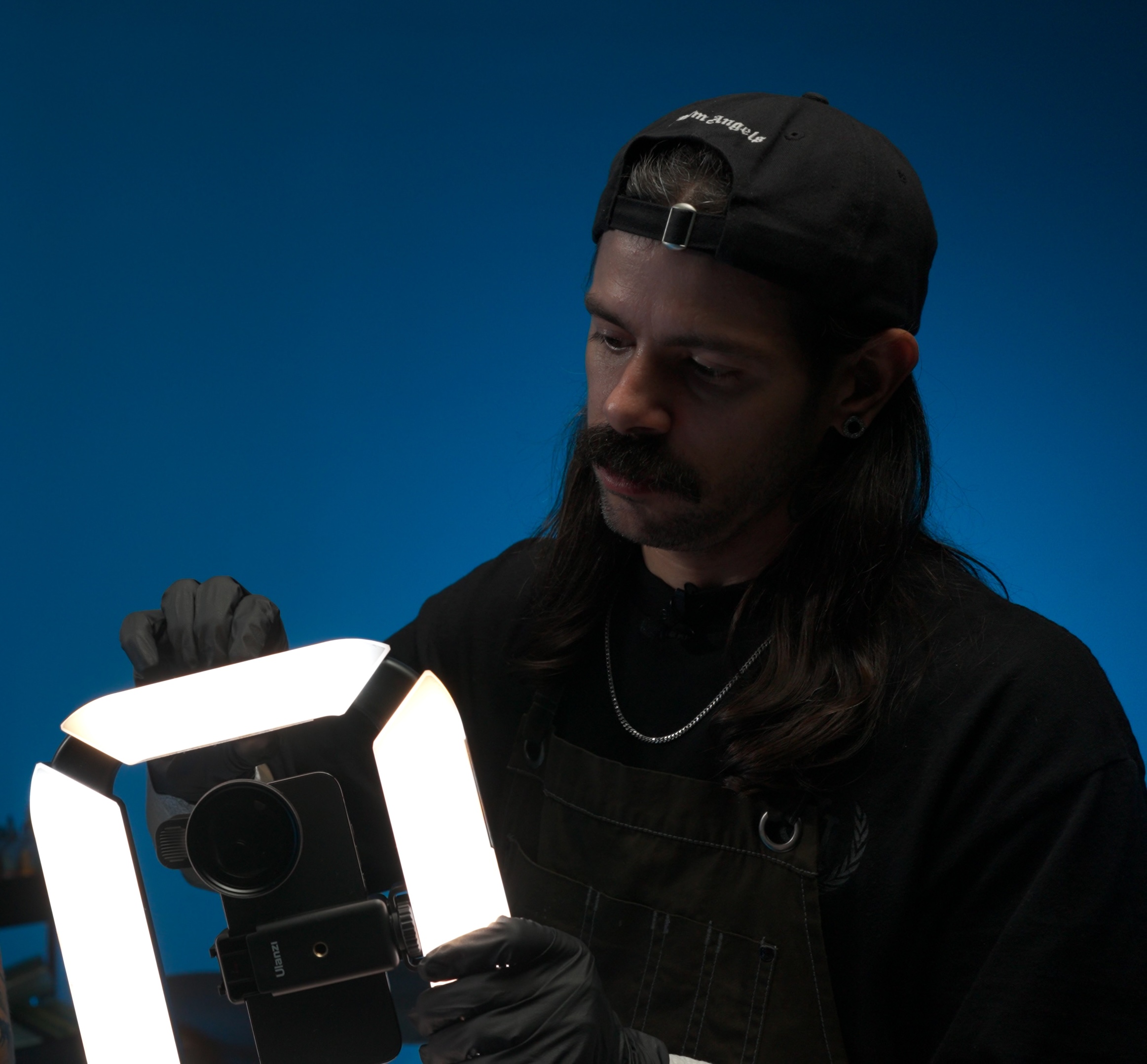 Gian setting up the polarizer and lighting rig for tattoo photography